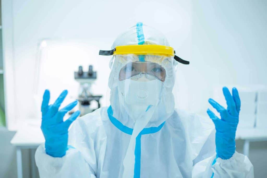 woman wearing PPE against covid-19